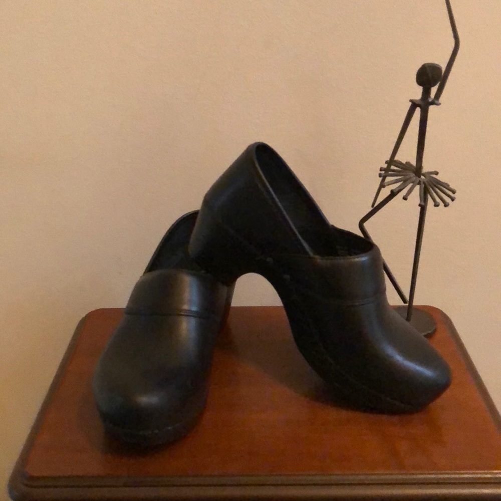 Dansko black leather clogs